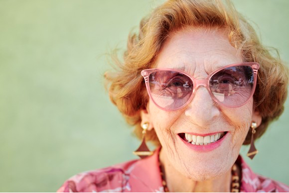 Image of a cheerful elderly lady.