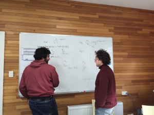 Researchers writing on whiteboard Creswick Campus Unimelb