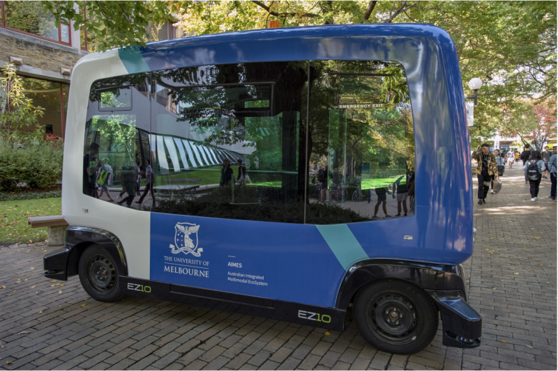 Image of the autonomous mini shuttle bus parked in the University of Melbourne campus.