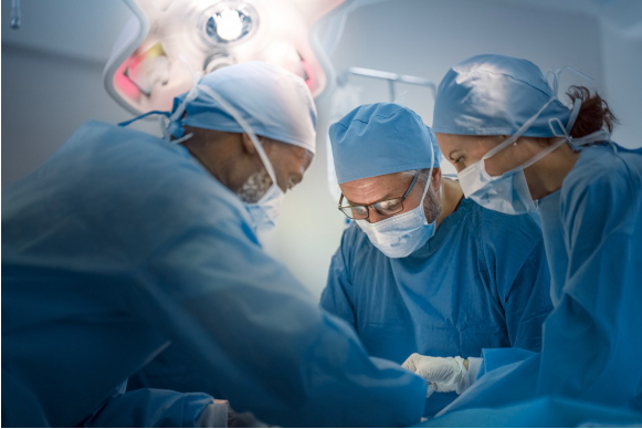 Image of doctors performing a surgery.