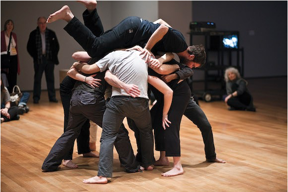 Image of dancers performing Huddle.