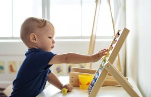 Child with abacus