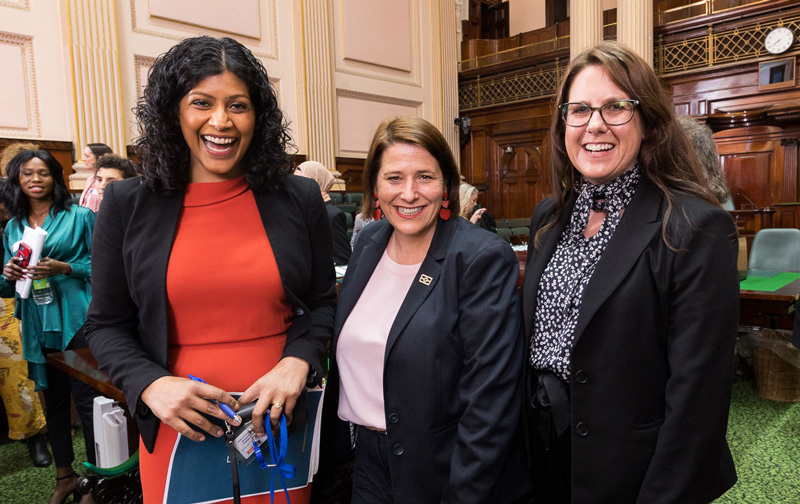 Samantha Ratnam MP, Juliana Addison MP and Cathrine Buurnett-Wake MP pose for a photo in Victorian Parliament chambers