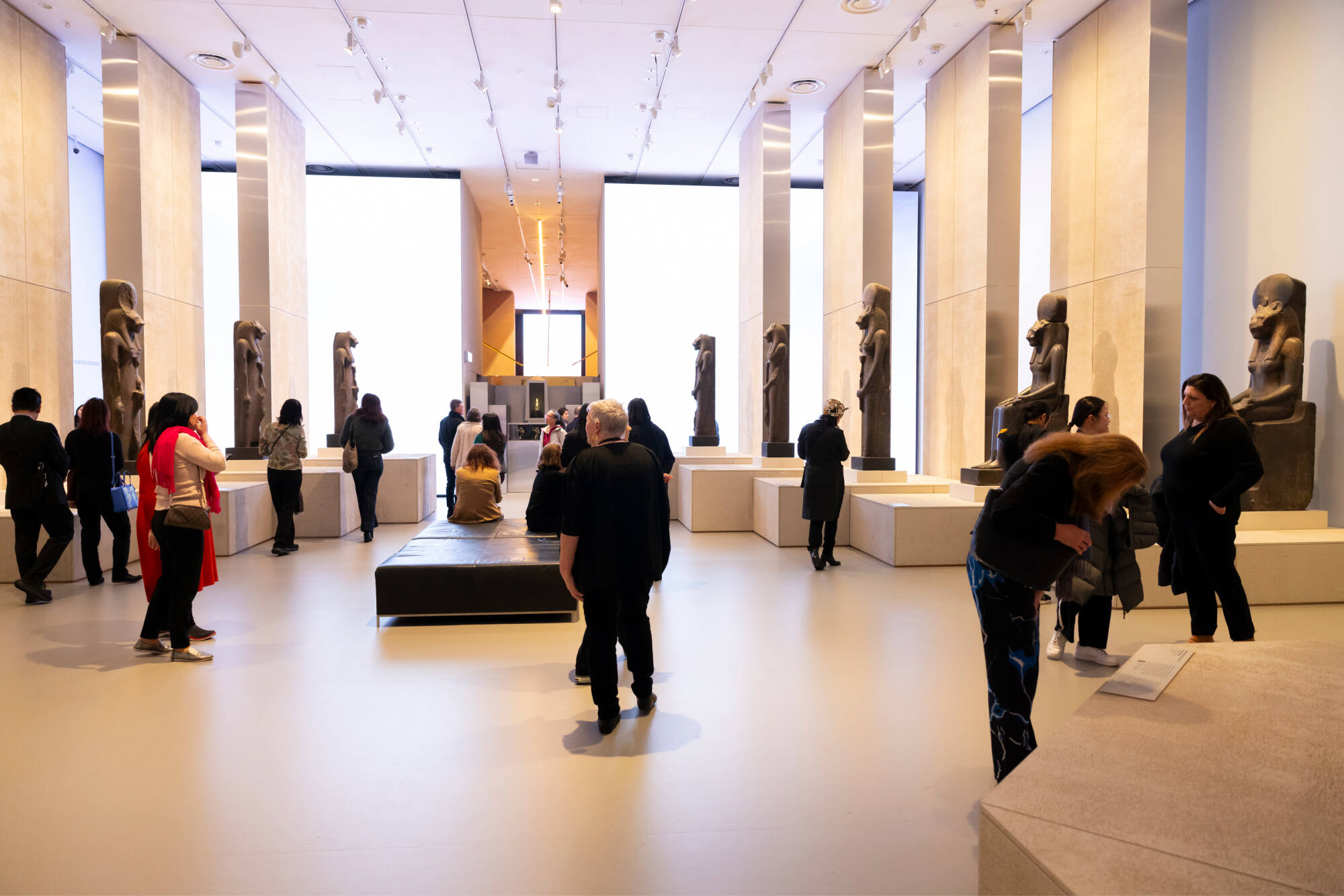 Alumni viewing the NGV's Pharaoh exhibition.