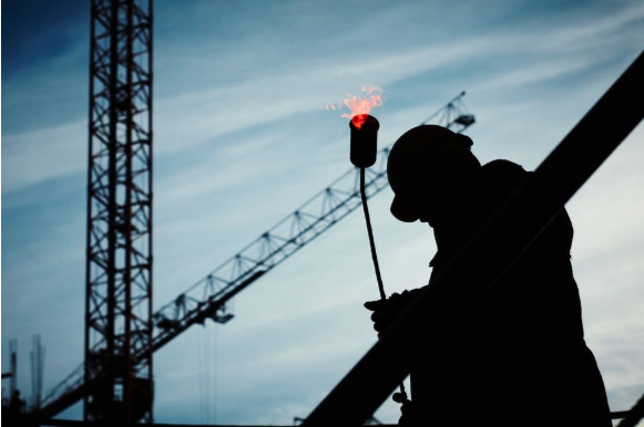 Image of a construction worker on a work site.