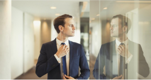 Stock image of the a man with a suit in an office setting.