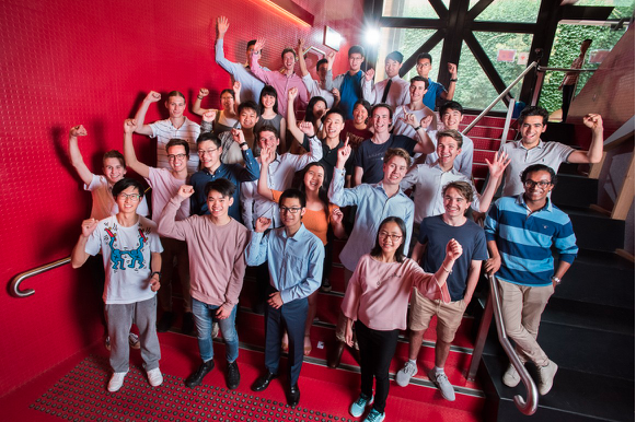 Group photo of some of the highest-achieving VCE students in the University of Melbourne campus.
