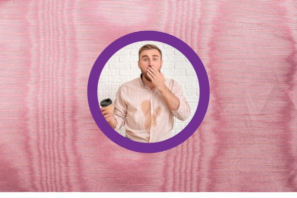 A pink moire background with a purple circle in the middle depicting a photo of a man with a coffee cup looking shocked because he has spilled coffee on his shirt.
