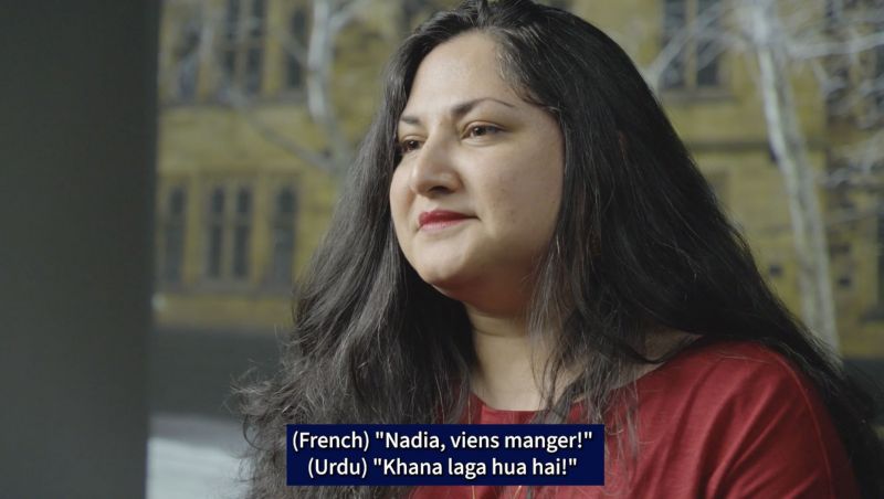 A woman in the studio says a sentence in two languages, French and Urdu.