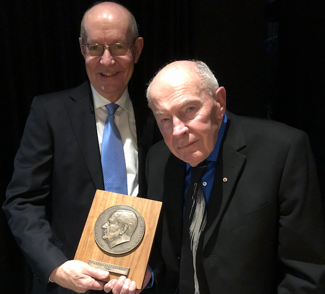 Professor Gary McPherson presents the 2017 Heinze Award to Associate Professor Ronald Farren-Price at Hamer Hall. Image supplied.