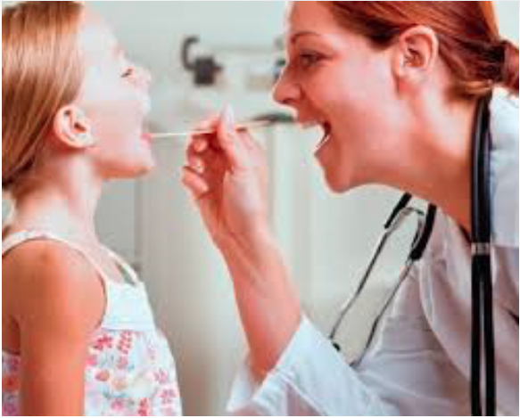 Image of doctor examining a patient.