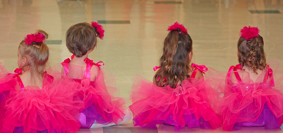 Image of young ballerinas with pink tutus.