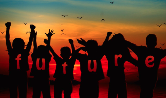 Image of silhouettes of children with the word future written across them.
