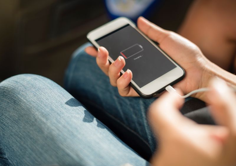 Phone with a flat battery being charged