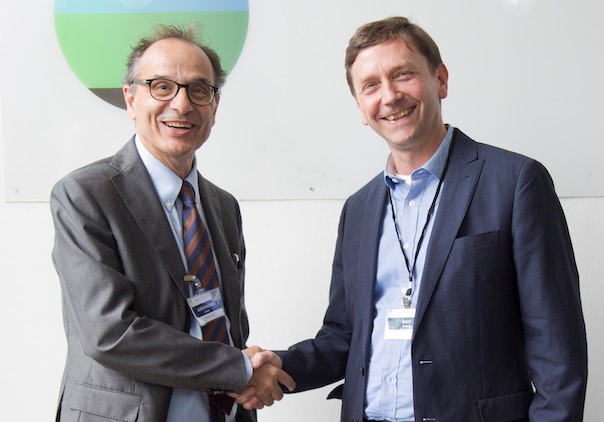 Professor Alessandro Lanza and Professor Ralph Haese shake hands in Carbonia.