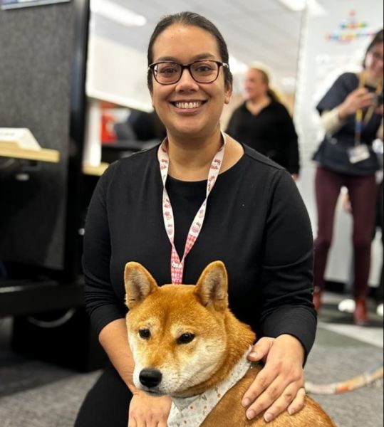Keshia Arbour pictured her RIC team and dog.